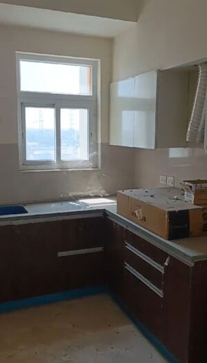 Kitchen in 3 BHK Apartment at Puri Aanandvilas, Sector 81 – for Rent