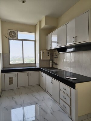 Kitchen in 2 BHK Apartment at Unitech The Residences Gurgaon, Sector 33 – for Sale