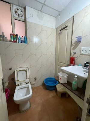 Bathroom in 3 BHK Apartment at Sushma Elite Cross, Dhakoli – for Rent