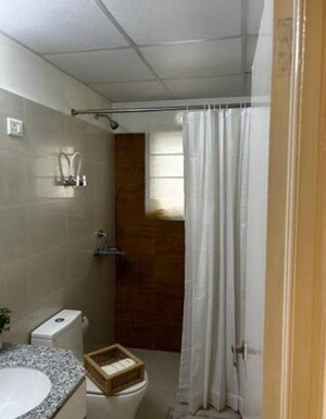 Bathroom in 3 BHK Apartment at Pardos Okas Residency, Sushant Golf City – for Rent