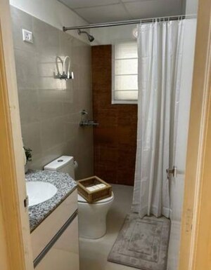 Bathroom in 3 BHK Apartment at Pardos Okas Residency, Sushant Golf City – for Rent