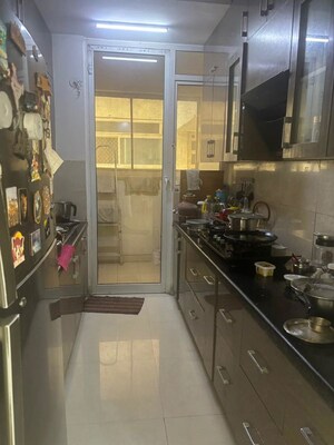 Kitchen in 3 BHK Apartment at Mahagun Moderne, Sector 78 – for Rent
