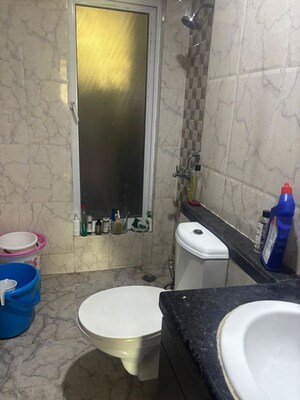 Bathroom in 3 BHK Apartment at Mahagun Moderne, Sector 78 – for Rent
