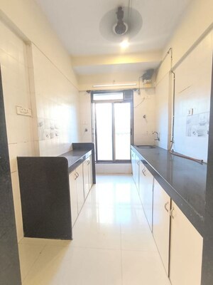 Building Lobby in 2 BHK Apartment at Kalpataru Classic, Malad West – for Rent