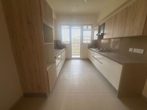 Kitchen in 4 BHK Apartment at Sagitarius Bluegrass Residences Tower 2, Kalyani Nagar – for Rent