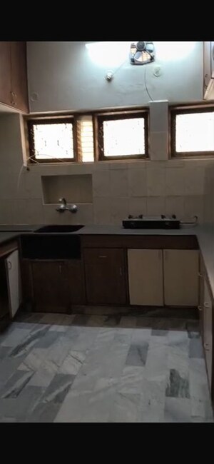 Kitchen in 4 BHK Apartment at Langford Town – for Rent