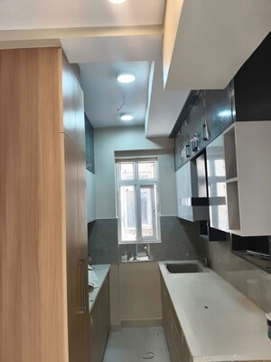 Kitchen in 2.5 BHK Builder Floor at Smart World Orchard, Sector 61 – for Rent