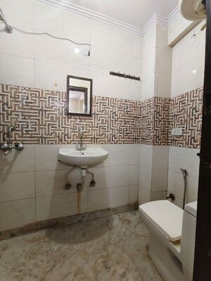 Bathroom in 2 BHK Builder Floor at Kalkaji – for Rent