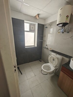 Bathroom in 2 BHK Apartment at Sushma Joynest ZRK, Ghazipur – for Rent