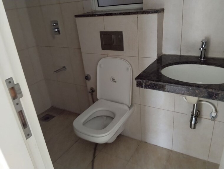 Bathroom, godrej-boulevard 2 Bedroom 750 Sq.Ft. Apartment In Manjari Pune 10357634