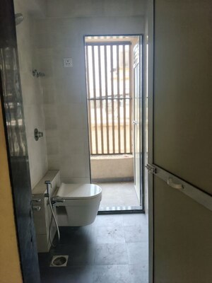 Bathroom in 3 BHK Apartment at Bhaskar Colony – for Rent