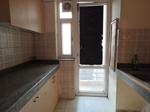 Kitchen in 3 BHK Apartment at Mahindra Aura, Sector 110a – for Rent