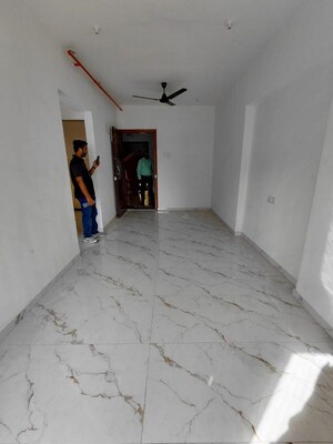 Building Lobby in 1 BHK Apartment at Tilak Nagar – for Rent