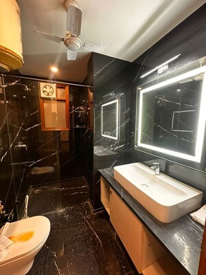 Bathroom in 3 BHK Builder Floor at Pamposh Enclave – for Sale