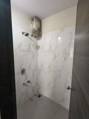 Bathroom in 1 BHK Apartment at Dosti Desire, Brahmand – for Rent