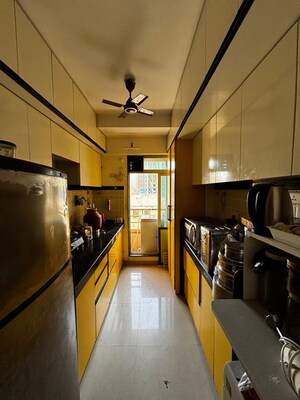 Kitchen in 2 BHK Apartment at Damji Shamji Kalpvruksha Tulip, Kasarvadavali – for Rent