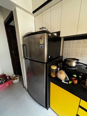 Kitchen in 2 BHK Apartment at Damji Shamji Kalpvruksha Tulip, Kasarvadavali – for Rent