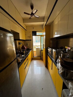 Kitchen in 2 BHK Apartment at Damji Shamji Kalpvruksha Tulip, Kasarvadavali – for Rent