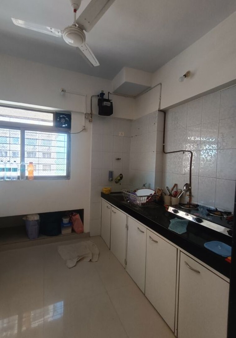 Kitchen, ajmera-bhakti-park 1 Bedroom 448 Sq.Ft. Apartment In Bhakti Park Mumbai 10357895