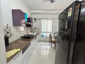 Kitchen in 2 BHK Apartment at Puranik Rumah Bali, Ghodbunder Road – for Rent