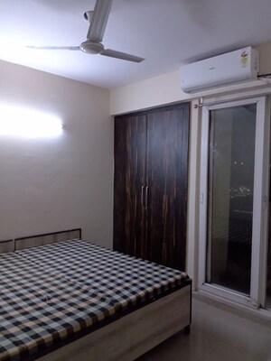 Bedroom in 2 BHK Apartment at Amrapali Zodiac, Sector 120 – for Sale
