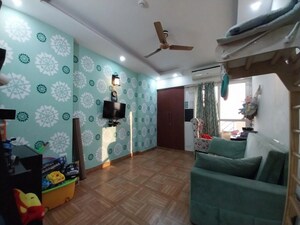 Living Room in 2 BHK Apartment at Saya Gold Avenue, Vaibhav Khand – for Sale