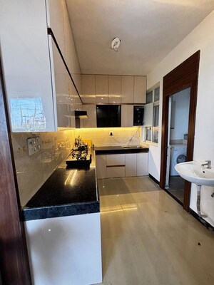 Kitchen in 2 BHK Apartment at Parthsarthy Enclave – for Sale