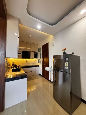 Kitchen in 2 BHK Apartment at Parthsarthy Enclave – for Sale