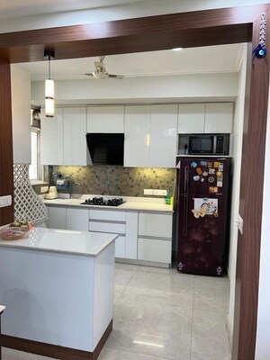 Kitchen in 2 BHK Apartment at Unitech The Residences Gurgaon, Sector 33 – for Rent