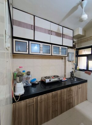 Kitchen in 1 BHK Apartment at VR Bhoomi Acres F Wing, Ghodbunder Road – for Rent