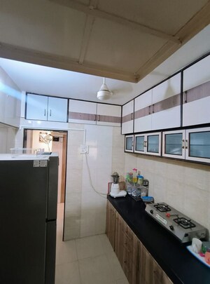 Kitchen in 1 BHK Apartment at VR Bhoomi Acres F Wing, Ghodbunder Road – for Rent