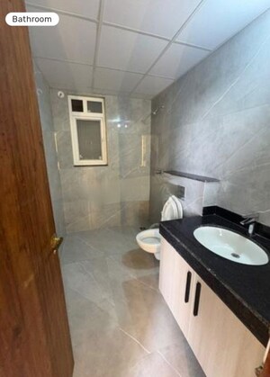Bathroom in 4 BHK Apartment at Rishita Mulberry Heights, Sushant Golf City – for Rent