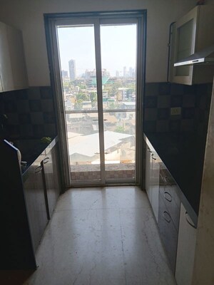 Kitchen in 4 BHK Apartment at Parth Magnus, Sanpada – for Sale
