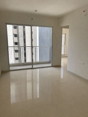 Living Room in 2.5 BHK Apartment at Godrej Park Greens, Mamurdi – for Rent