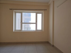 Room in 3.5 BHK Apartment at Mahindra Aura, Sector 110a – for Rent
