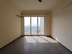 Room in 3.5 BHK Apartment at Mahindra Aura, Sector 110a – for Rent