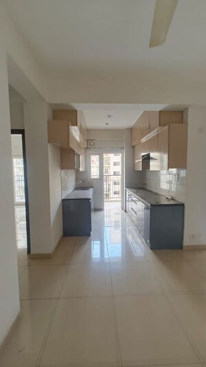 Kitchen in 2.5 BHK Apartment at Gulshan Botnia, Sector 144 – for Rent