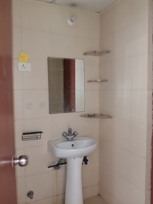 Bathroom in 2.5 BHK Apartment at Mahagun My Woods, Sector 16c Greater Noida – for Rent