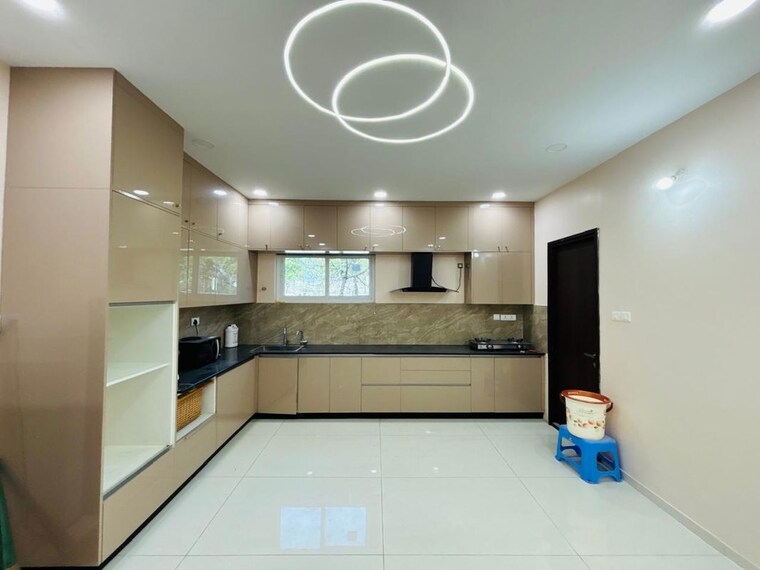 Kitchen, rajapushpa-green-dale 5 Bedroom 4200 Sq.Ft. Villa In Tellapur Hyderabad 10358503