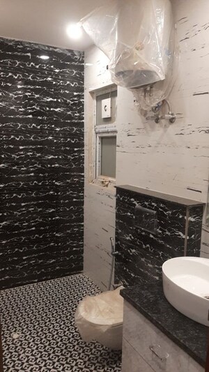Bathroom in 3 BHK Apartment at Godrej Meridien, Sector 106 – for Rent