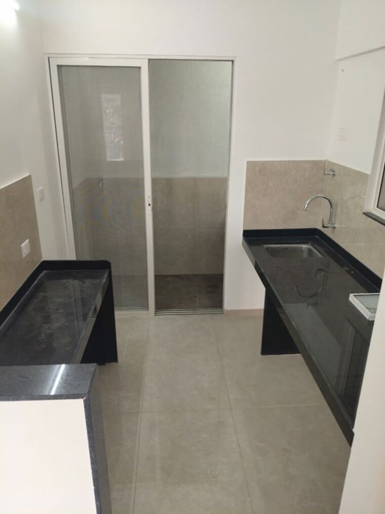 Kitchen, welworth-purnam 2 Bedroom 650 Sq.Ft. Apartment In Hinjewadi Pune 10358546