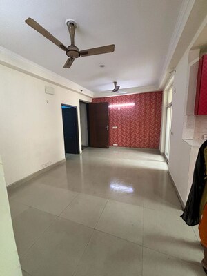 Living Room in 2.5 BHK Apartment at Amrapali Silicon City, Sector 76 – for Rent