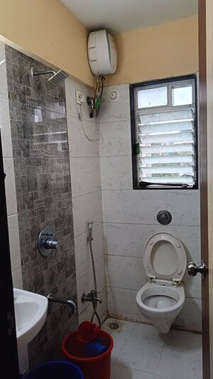 Bathroom in 1 BHK Apartment at Milan Residency, Malad West – for Sale