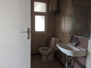 Bathroom in 4 BHK Apartment at Mahindra Aura, Sector 110a – for Rent