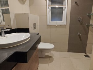 Bathroom in 4 BHK Apartment at Mahindra Aura, Sector 110a – for Rent