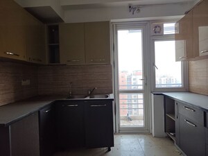 Kitchen in 4 BHK Apartment at Mahindra Aura, Sector 110a – for Rent