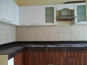 Kitchen in 4 BHK Apartment at Mahindra Aura, Sector 110a – for Rent