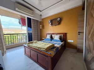 Bedroom in 3 BHK Apartment at Omkar Alta Monte, Malad East – for Rent