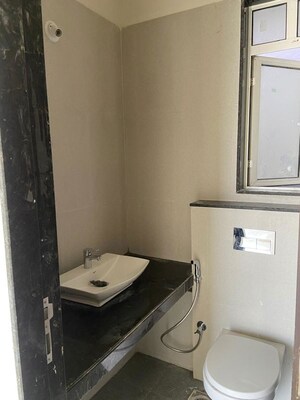 Bathroom in 2 BHK Apartment at Lodha Amara, Kolshet Road – for Rent
