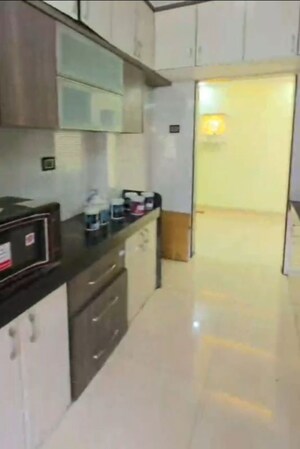 Kitchen in 2 BHK Apartment at Chheda Avirahi, Mira Road – for Rent